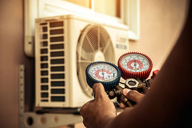 Professional Heat Pump Repair technician working in Elizabethtown, NC
